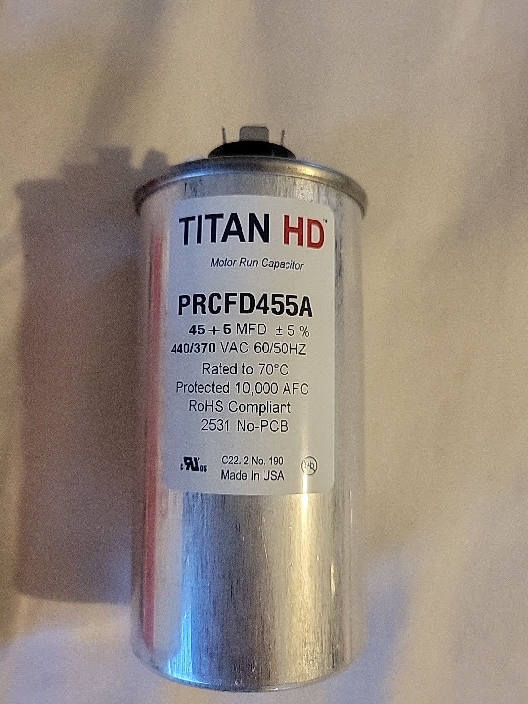TITAN HD 45 Plus 5 MFD, 440V/370V Dual Voltage Round Run Capacitor (PRCFD455A)